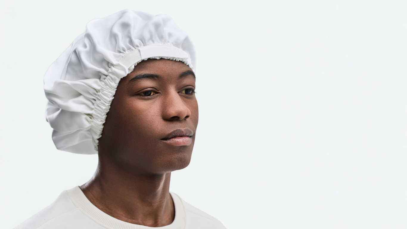 Person wearing a white NIMBO against a plain background